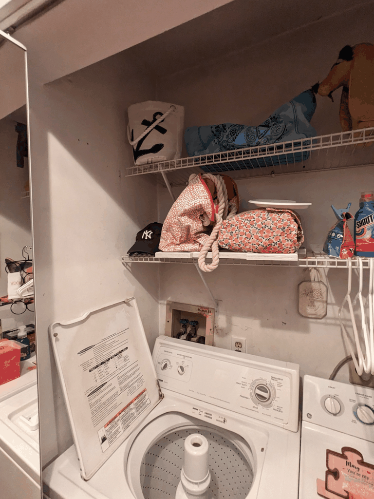 DTA technician replacing a failed drain pump motor on a GE front load washing machine in West Philadelphia