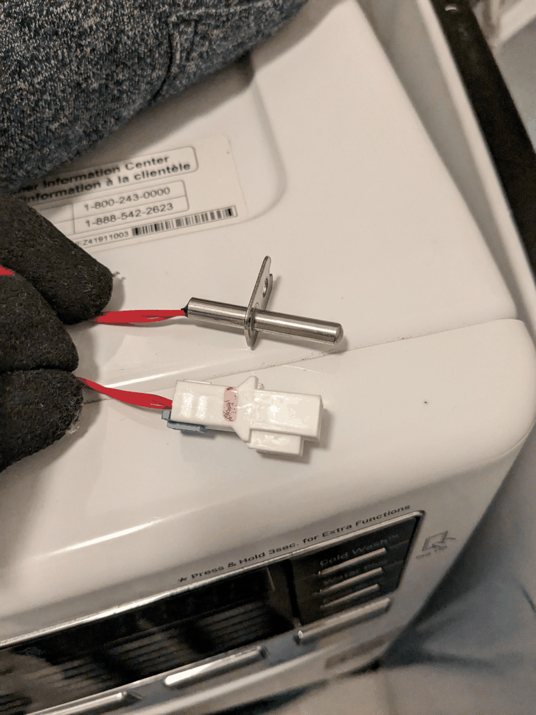 Replacing worn drum support rollers and drive belt during an LG dryer repair in University City