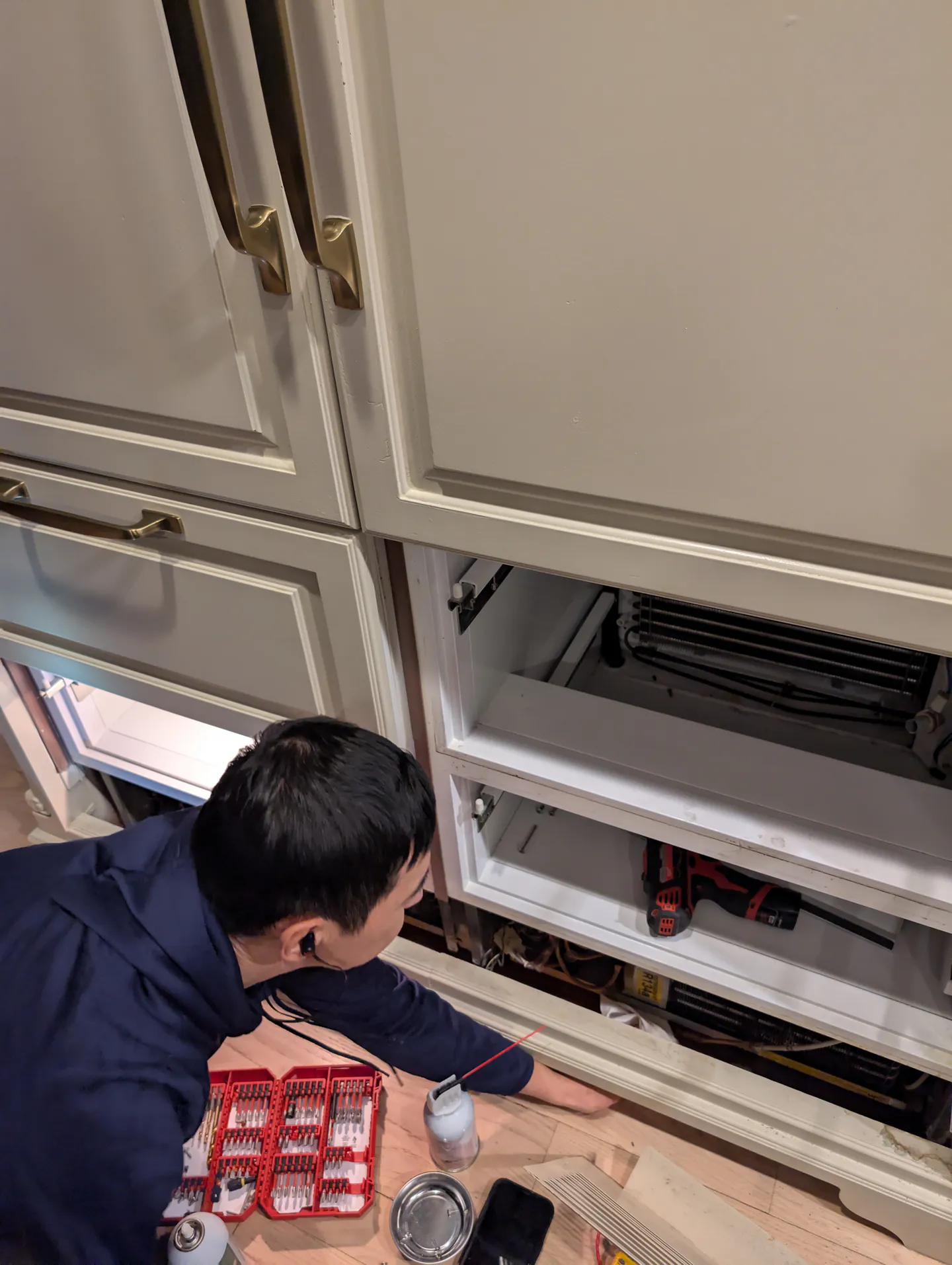 DTA technician accessing a Sub-Zero 700 TC during evaporator fan repair in Center City Philadelphia