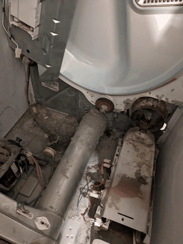 Whirlpool dryer repair in Northeast Philadelphia replacing a burnt-out heating element and testing thermal safety switches